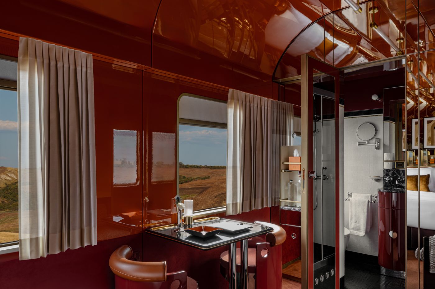 Suite table, armchairs and en-suite bathroom