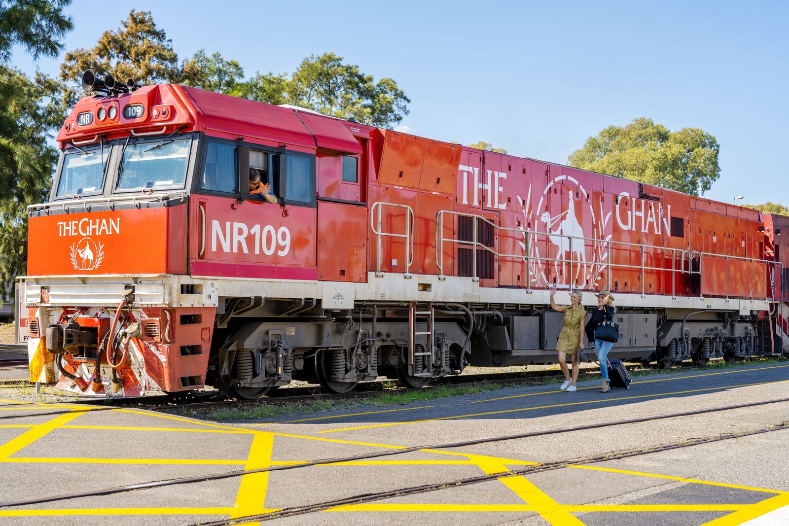 The red Ghan locomotive standing in the outback