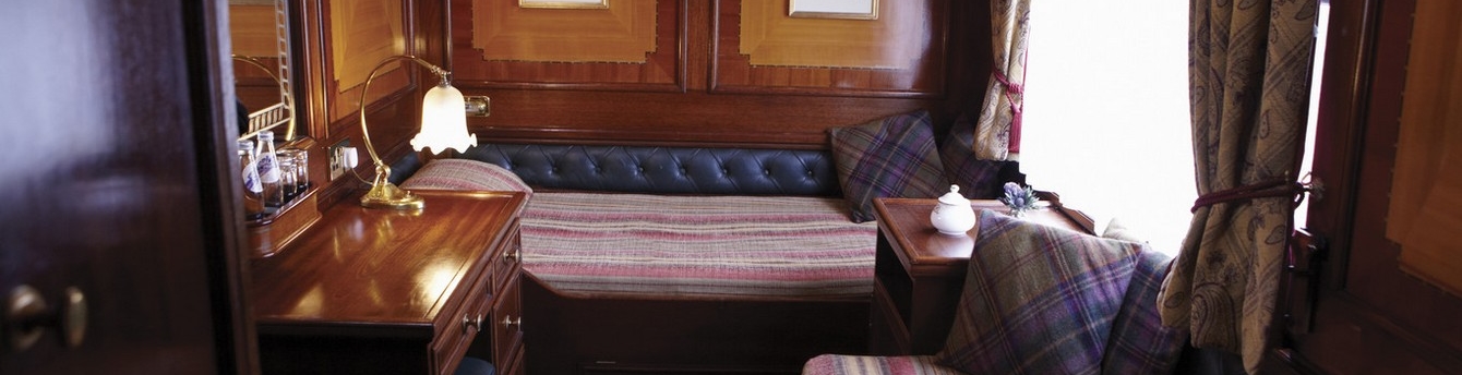 Settle into your private cabin and experience the luxury and comfort of the Belmond Royal Scotsman