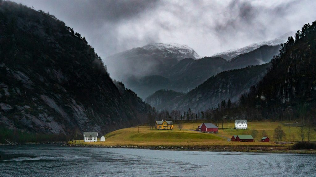 A fjord village beneath the mountains — Mostraumen, Norway