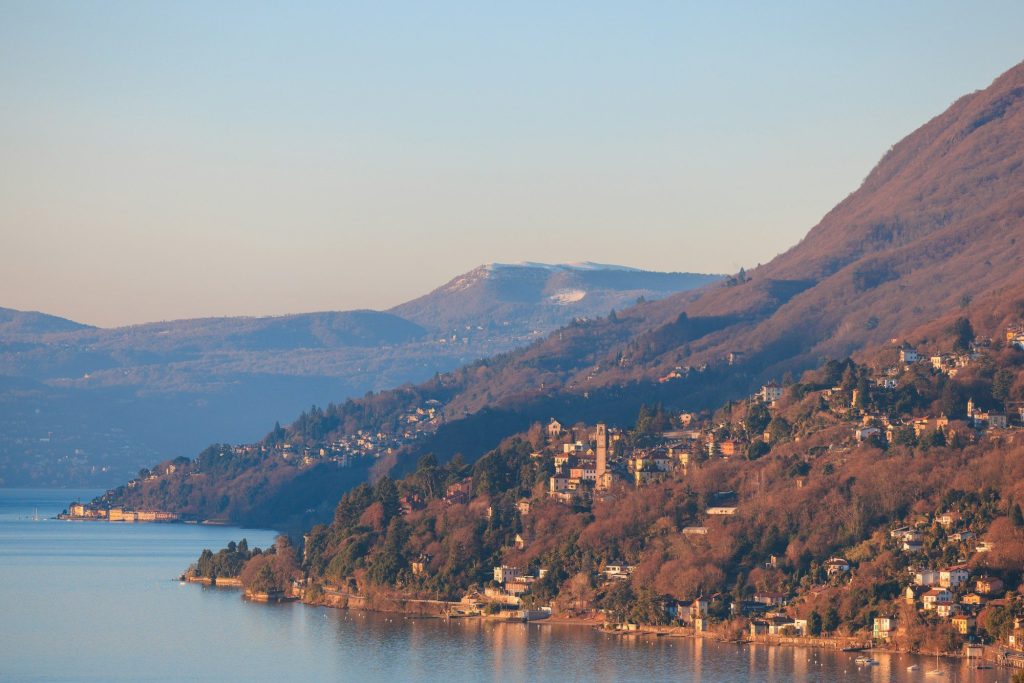 Houses on a wooded hillside above the lake — Cannero Riviera, Lake Maggiore, Italy