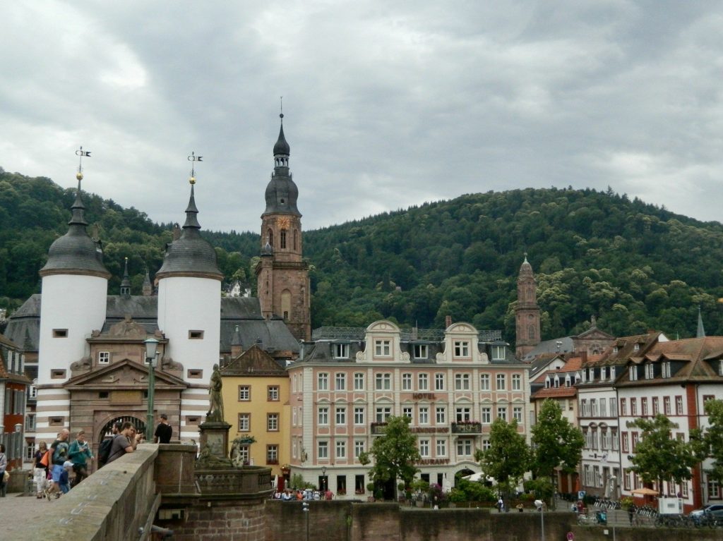 The old town of Heidelberg beneath its wooded hills